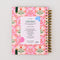 back view of pink folk floral 17-month planner with green elastic closure