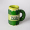 side view of green pickle jar ceramic mug with pickle crunchy dill label and pickle handle
