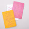 set of three compact notebooks with yellow cover and connect the dots 'i've got things to do', pink word search that says 'ready for anything' and white notebook paper with pink 'infinite potential' across the front
