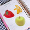 set of 4 sensory sticker in strawberry, grapefruit, banana, and apple in a planner