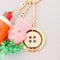 up close of button Fidget spinner, paint tube de-stress paint tube and beaded tulip keychain
