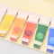 up close of oil paint shaped tab notes