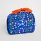 cobalt blue toiletry bag with red bow handle and colorful folk floral print