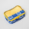 blue and white folk floral packing cube with yellow trim