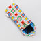 sideview of white quilted sunglass case with colorful quilted print