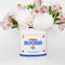 pure cane sugar ceramic sugar bag vase with white and pink flowers inside