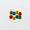 cream round sticker with colorful worm that says 'BOOKWORM'