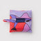 packaged multicolor baby baggu with purple dolphin print
