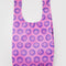 hot pink big baggu with cobalt smiley faces