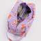 lavender dopp kit with orange butterfly print with items inside
