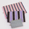 flattened set of three colorful stripe go pouch set