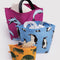 set of three go pouches: small orange turtle, medium blue penguins and large fuchsia dolphins filled with items