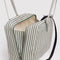 interior key leash of pale sage and white vertical stripe bowler bag