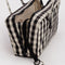opened black and cream nylon bowler bag
