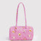 bright pink nylon bowler bag with melting gold star print