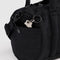 side view of black nylon duffle bag