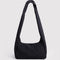 black meringue bag with thick twist strap