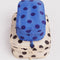 set of two packing cubes: blue polka dot and cream and black polka dot