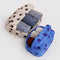 set of two packing cubes: blue polka dot and cream and black polka dot with clothing inside