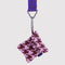 pink houndstooth puffy earbud case on a lanyard