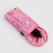 bright pink puffy glasses sleeve with gold melting star print with sunglasses inside