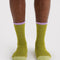 model wearing olive green socks with lavender and light green trim