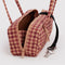 opened tan houndstooth small bowler bag