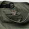 interior key leash of muted olive green small crescent bag