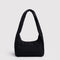 black small meringue bag with thick twist strap