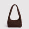 brown small meringue bag with thick twist strap