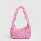 bright pink small meringue bag with gold melting star print and thick twist strap