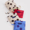 set of three standard baggus: cream with black polka dots, blue polka dot, and red polka dot