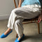 up close of model wearing white cotton balloon pants