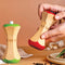 model using set of two wooden salt and pepper grinder in red and green
