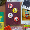 set of four snoopy halloween buttons: snoopy dracula, snoopy witch reading a book, snoopy skeleton, and snoopy witch head on a book