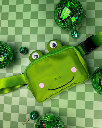 green froggy fanny pack with googly eyes and embroidered face