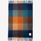 navy, light blue, orange and yellow checkered throw blanket with fringe