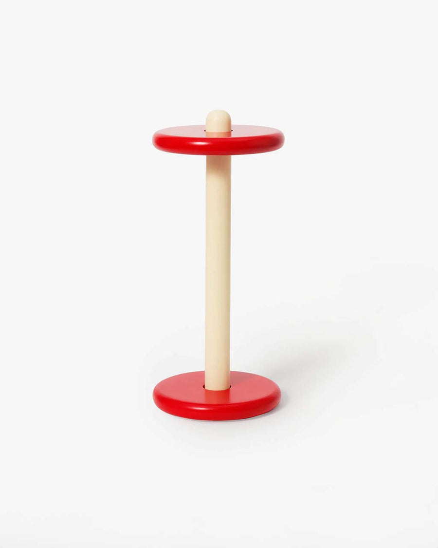 red and yellow spool paper towel holder