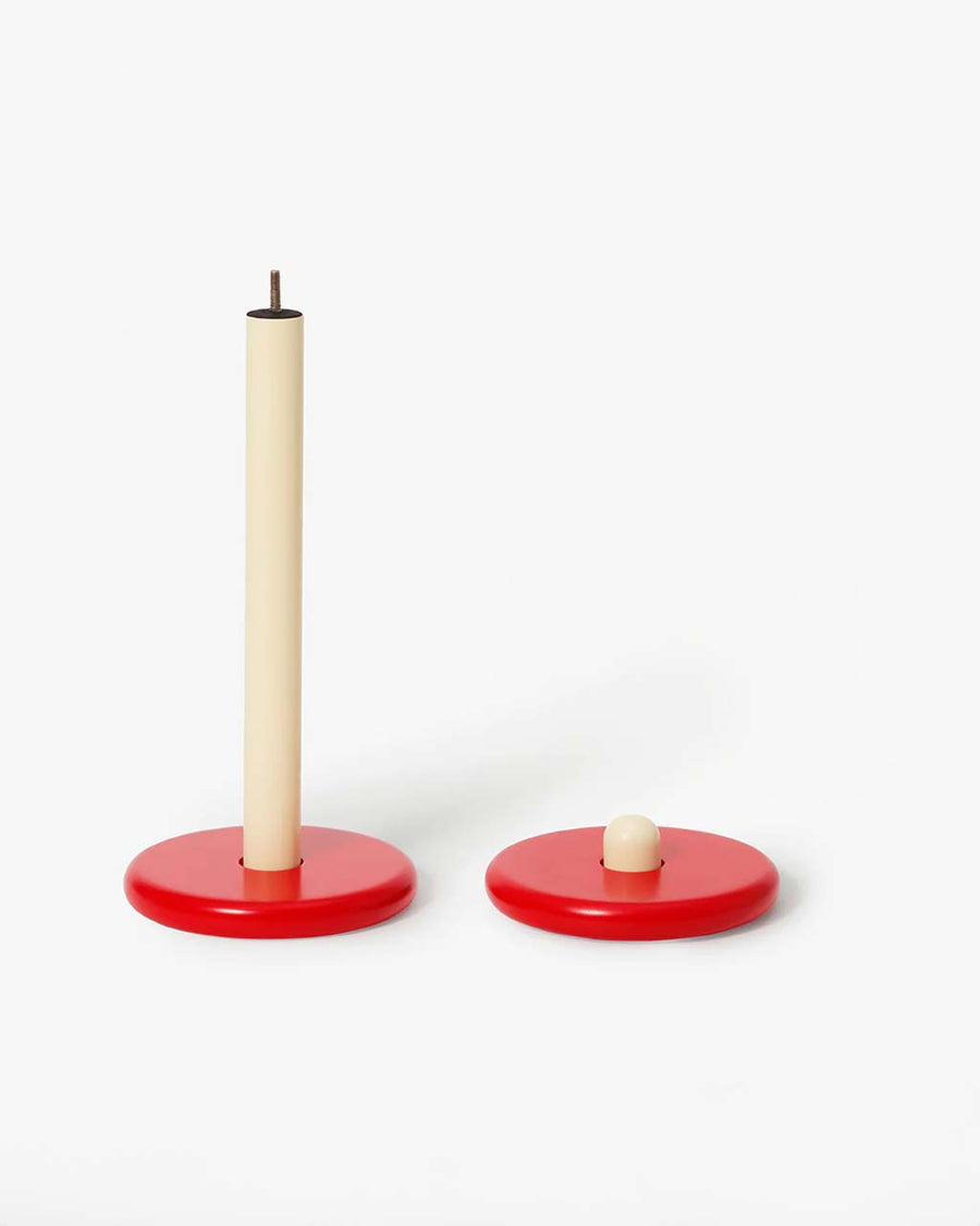 separated top of red and yellow spool paper towel holder