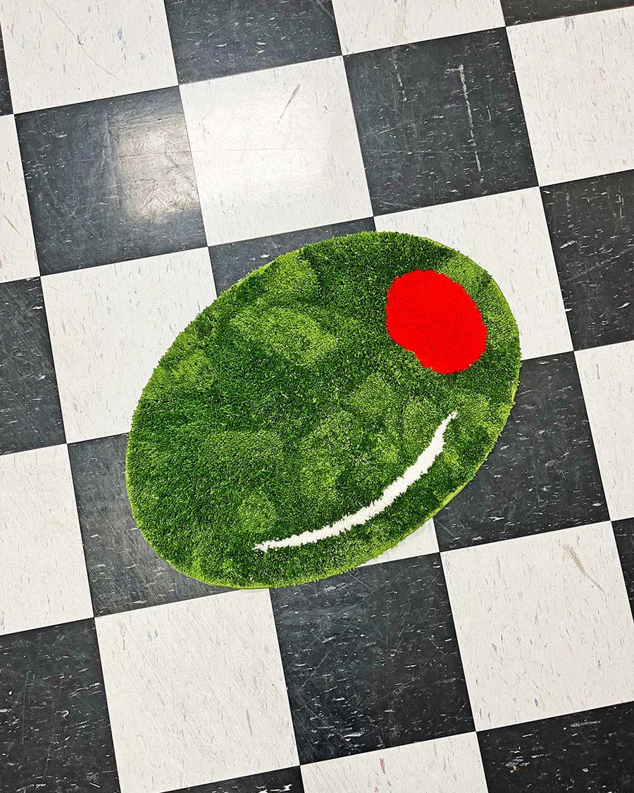 green olive shaped rug