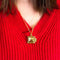 model wearing gold ravioli locket necklace