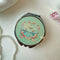 mint retro swan design pill case