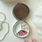three compartments inside of mint retro swan design pill case