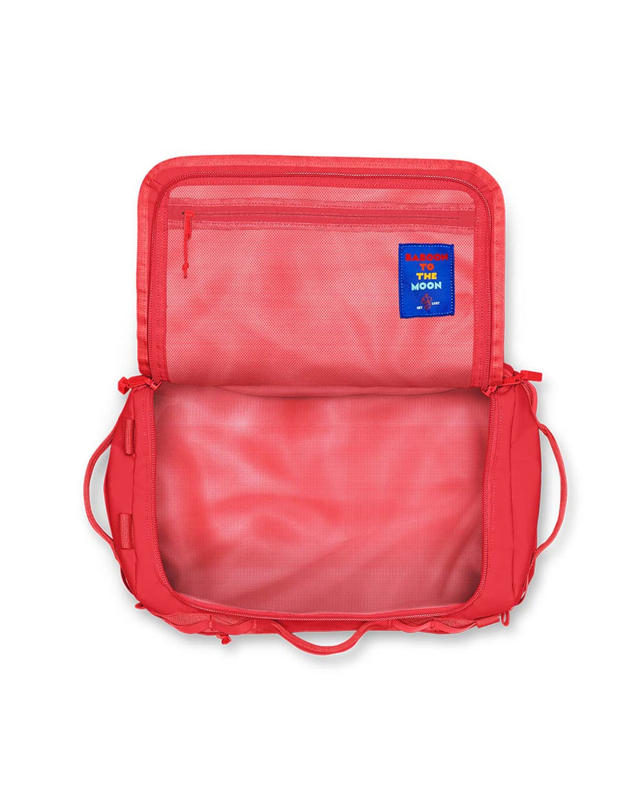 opened red mini travel bag