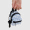 model holding light blue gingham backpack shaped keychain with black trim