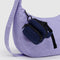 navy fanny pack keychain with black trim on a lavender bag