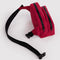 unbuckled cherry red fanny pack with black strap