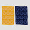 side 1 of set of two smiley hand towels: light blue and navy smiley and cream and yellow smiley
