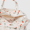 top zipper on cream horizontal zip duck bag with red painted wildflower print