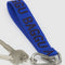cobalt keychain with dark blue 'baggu' font with keys attached